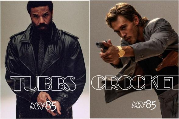 Pictures of Michael B. Jordan as Tubbs and Austin Butler as Crockett. Tubbs is wearing a heavy, black leather jacket, with a black shirt and dark tie. Crockett is holding a gun in a shooting position, and has on a gray suit, black T-shirt, and a gold watch.